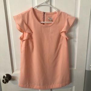 NWT J Crew women’s size 00 peach short sleeve top with a zipper in the back.